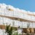 Résidence contemporaine avec balcons ajourés en métal blanc à Lattes.