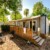 Mobile-home moderne en camping avec terrasse ombragée